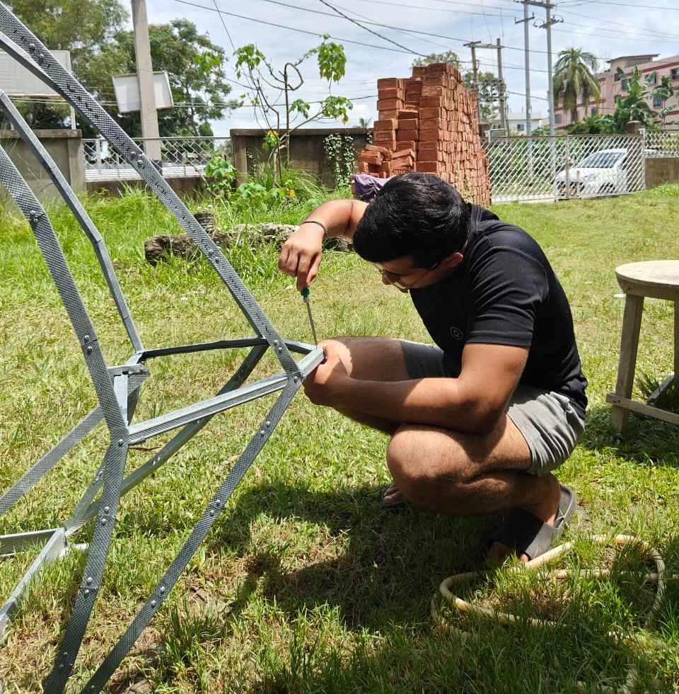 Ansh Bathija bolting the redesigned frame