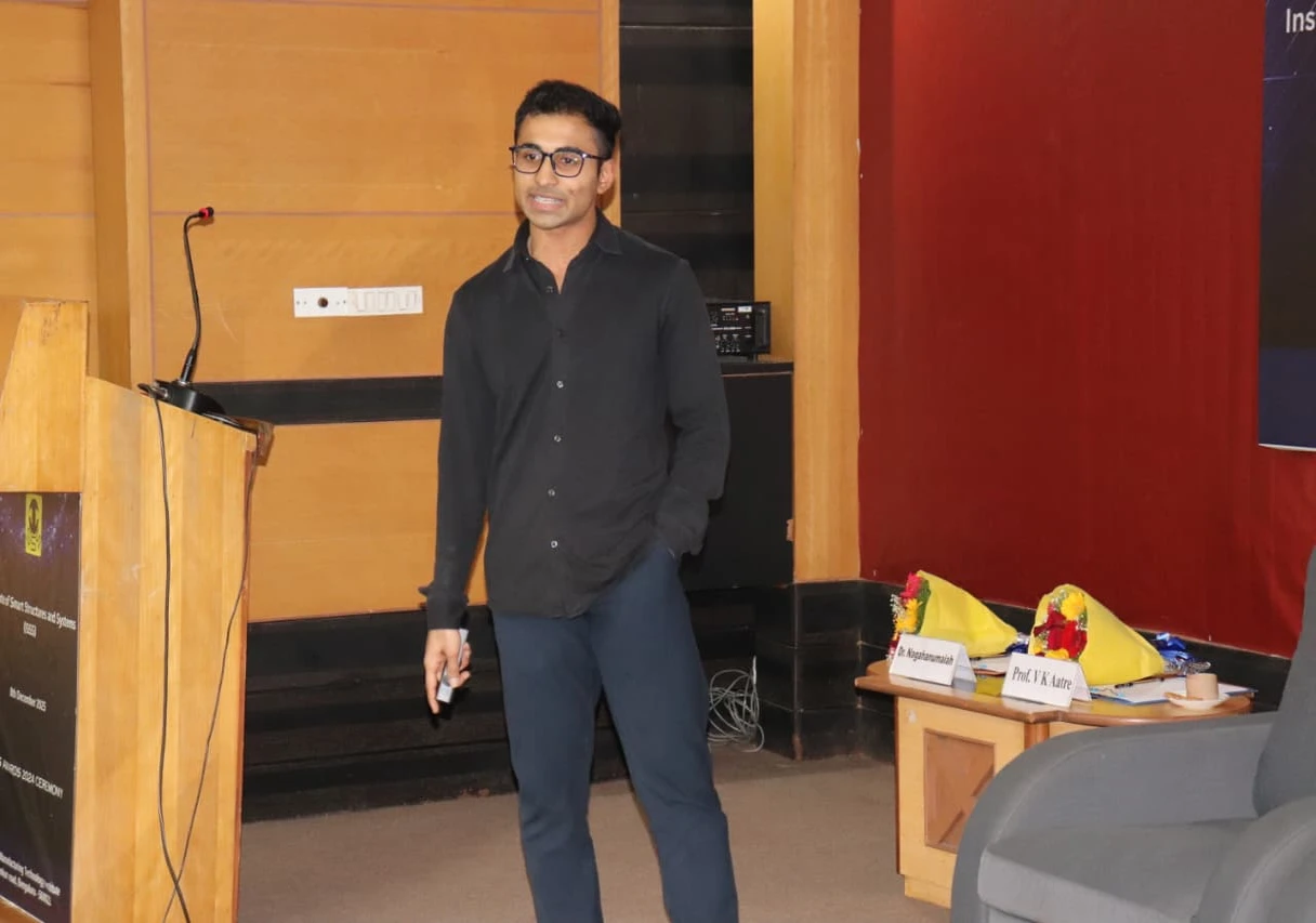Ark Patil presenting at the ISSS Awards 2024 ceremony in Bengaluru